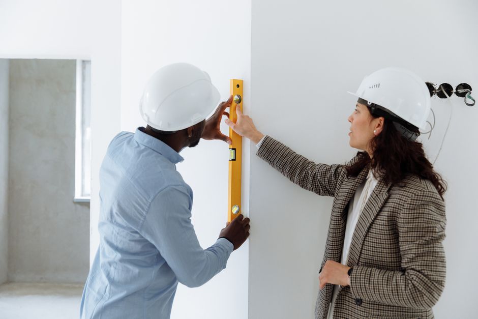 Professional contractor inspecting home insulation